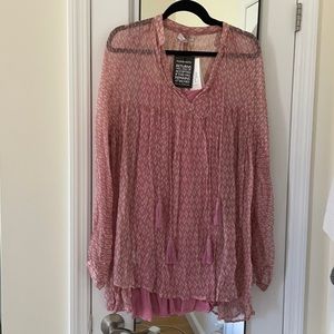Pink beach slip/cover up in a size M. Never worn!